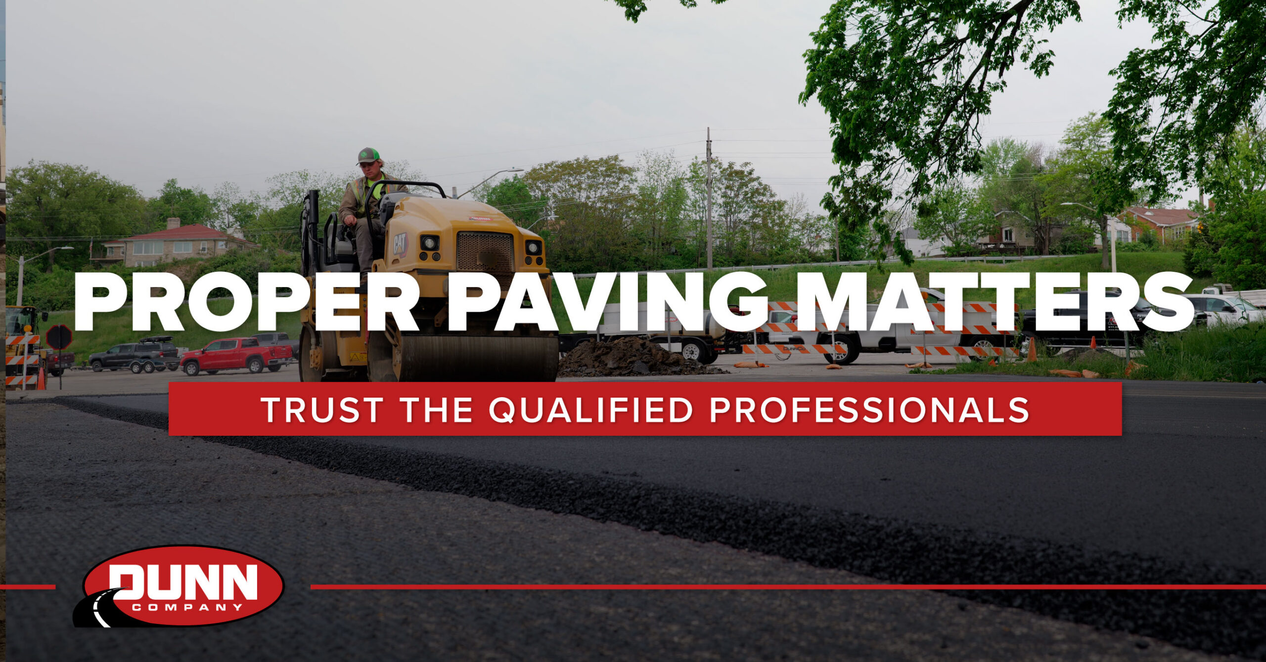 Dunn Company crew paving asphalt roadway demonstrating the importance of proper paving techniques and professional installation.