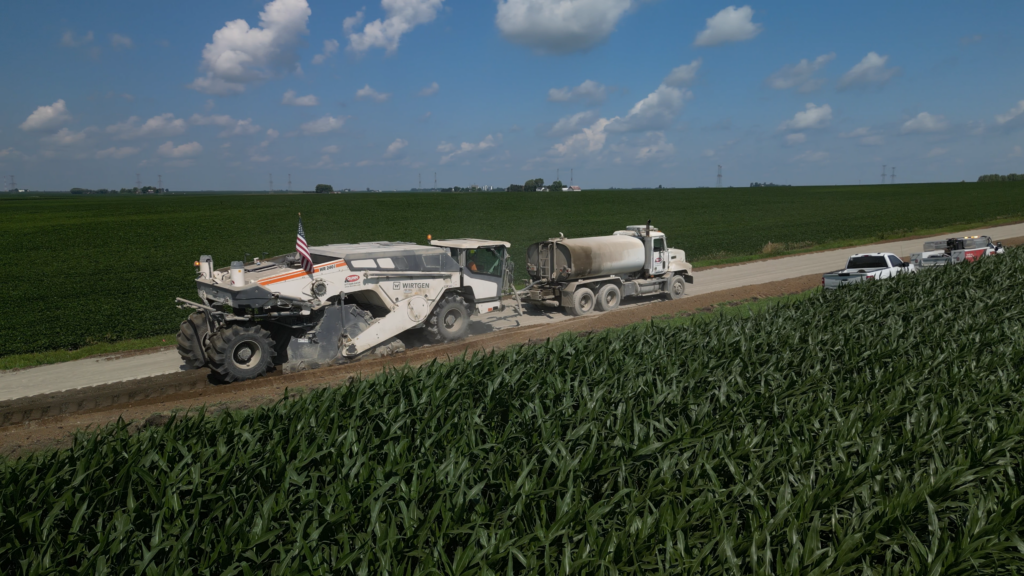 Dunn Company performing soil stabilization on rural roadways for a wind farm infrastructure project in Central Illinois.